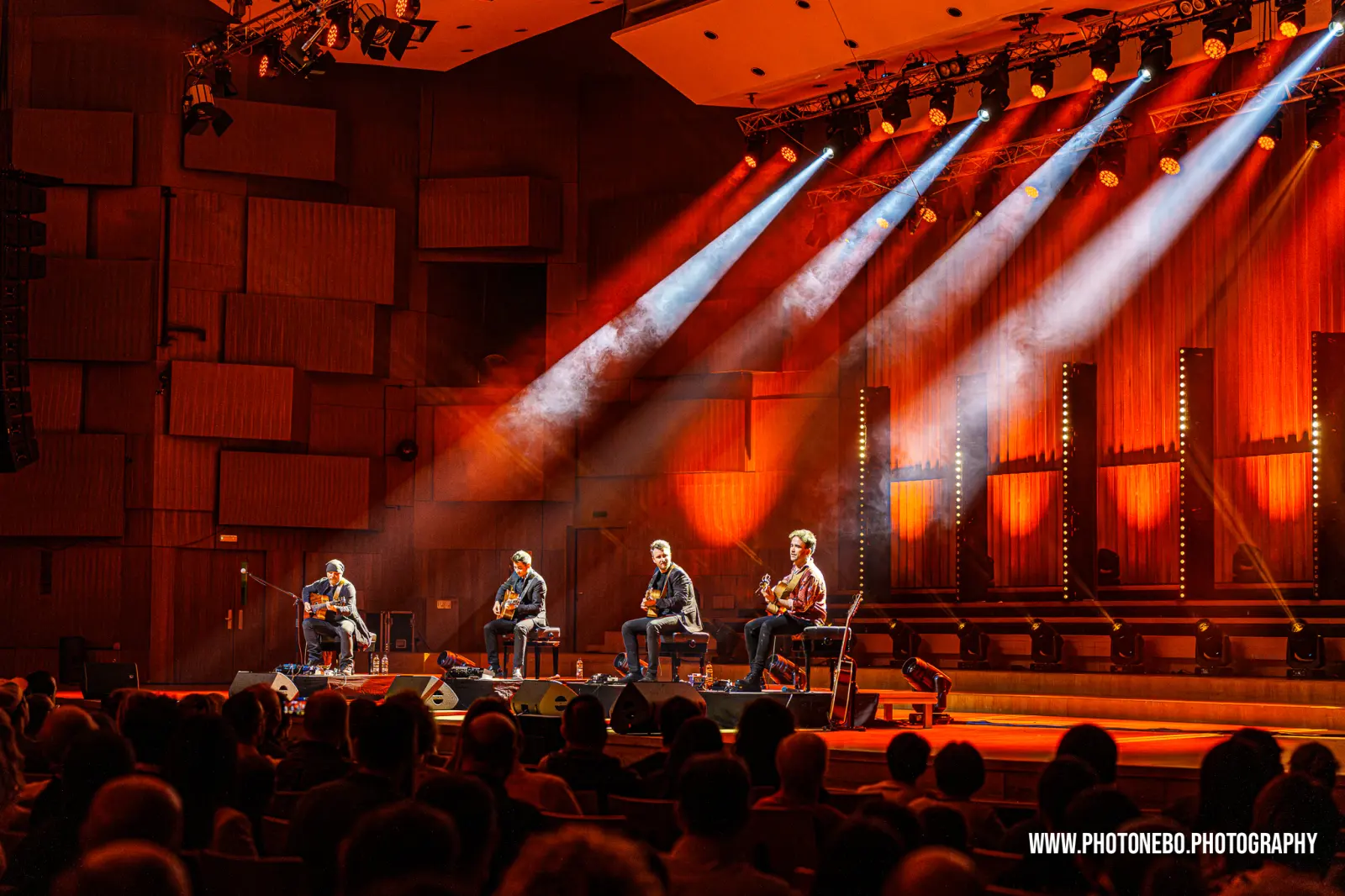 Professional photographer capturing 40 Fingers guitar quartet